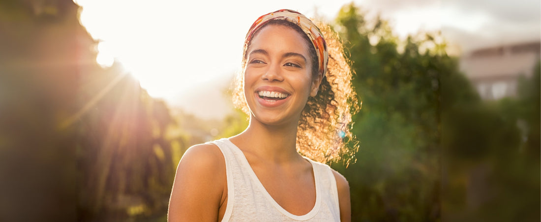 How can I wear a headband with a ponytail or a messy bun?