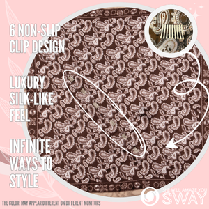 Brown paisley design scarf laid flat to show design