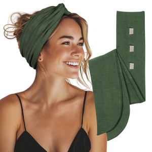 A woman wearing a dark green knotted headband