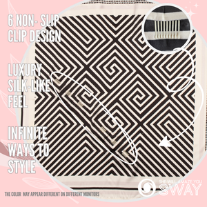 Black & white geometric patterned head scarf laid flat 