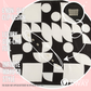 Berlin Black satin scarf headband laid flat with a close-up of SWAY’s patented non-slip clip