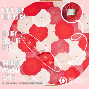 Rose like red & pink swirls headband laid flat showing clips 