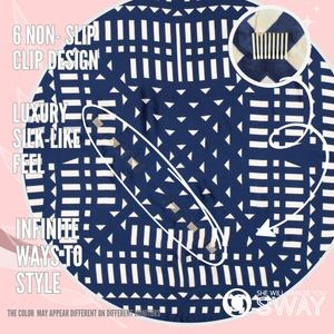 Navy blue & white headband laid flat showing clips 