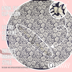 Milano Navy satin scarf headband laid flat with a close-up of SWAY’s patented non-slip clip