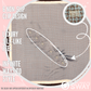 Blue and brown chain design headband laid flat with clips exposed 