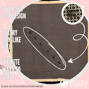 Black & Cream design headband laid flat to show pattern 