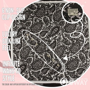 Vienna Black satin scarf headband laid flat with a close-up of SWAY’s patented non-slip clip