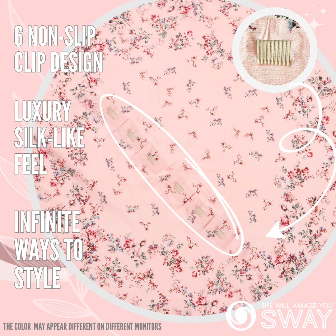 Small roses on a pink silky scarf laid flat with clips showing 