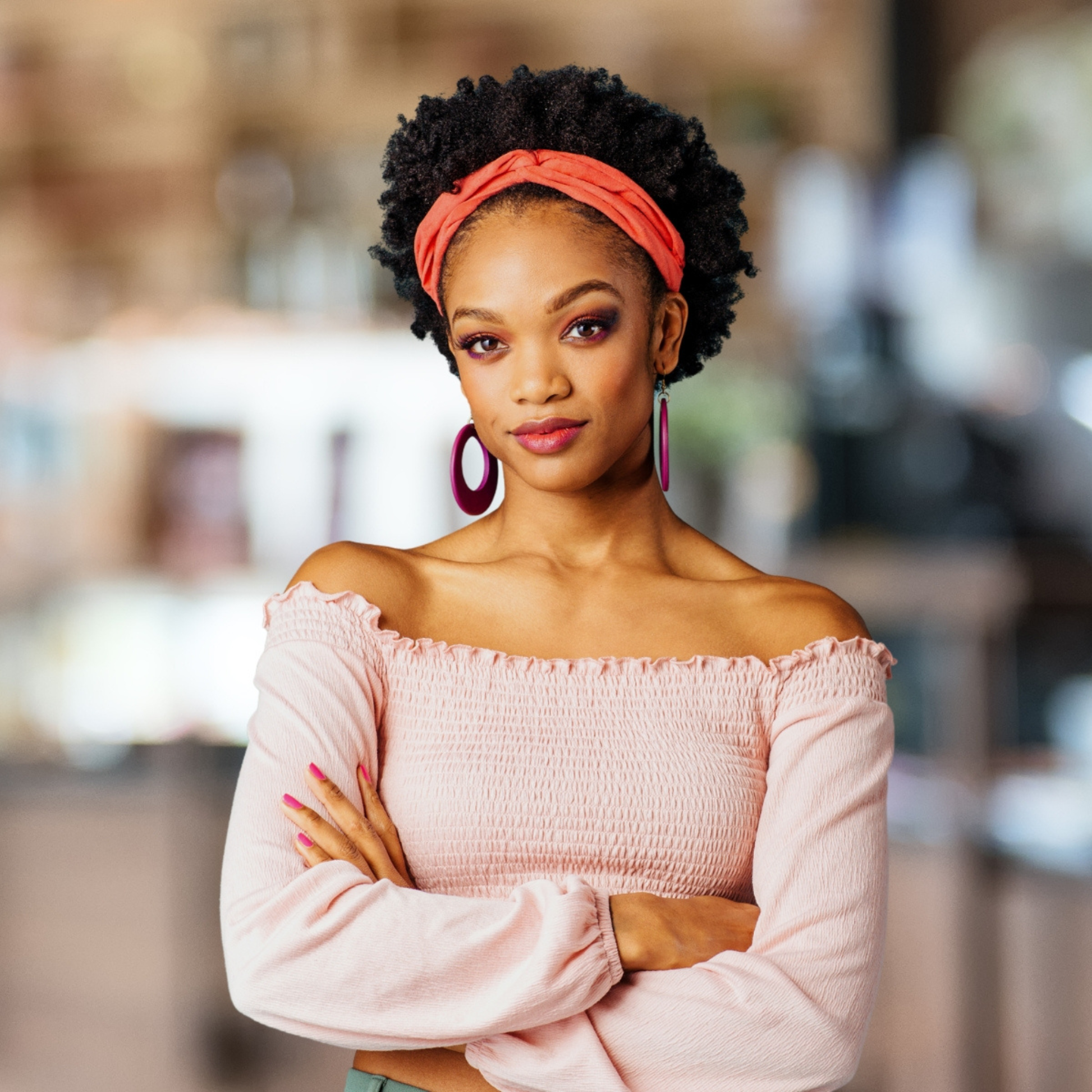 Woman wearing SWAY long stretch non-slip headband tied in a turban 