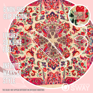 gold, pink and multicolor floral and swirl design headband laid flat