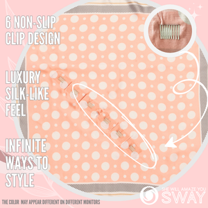 Pink polka dot pattern scarf laid flat showing clip design