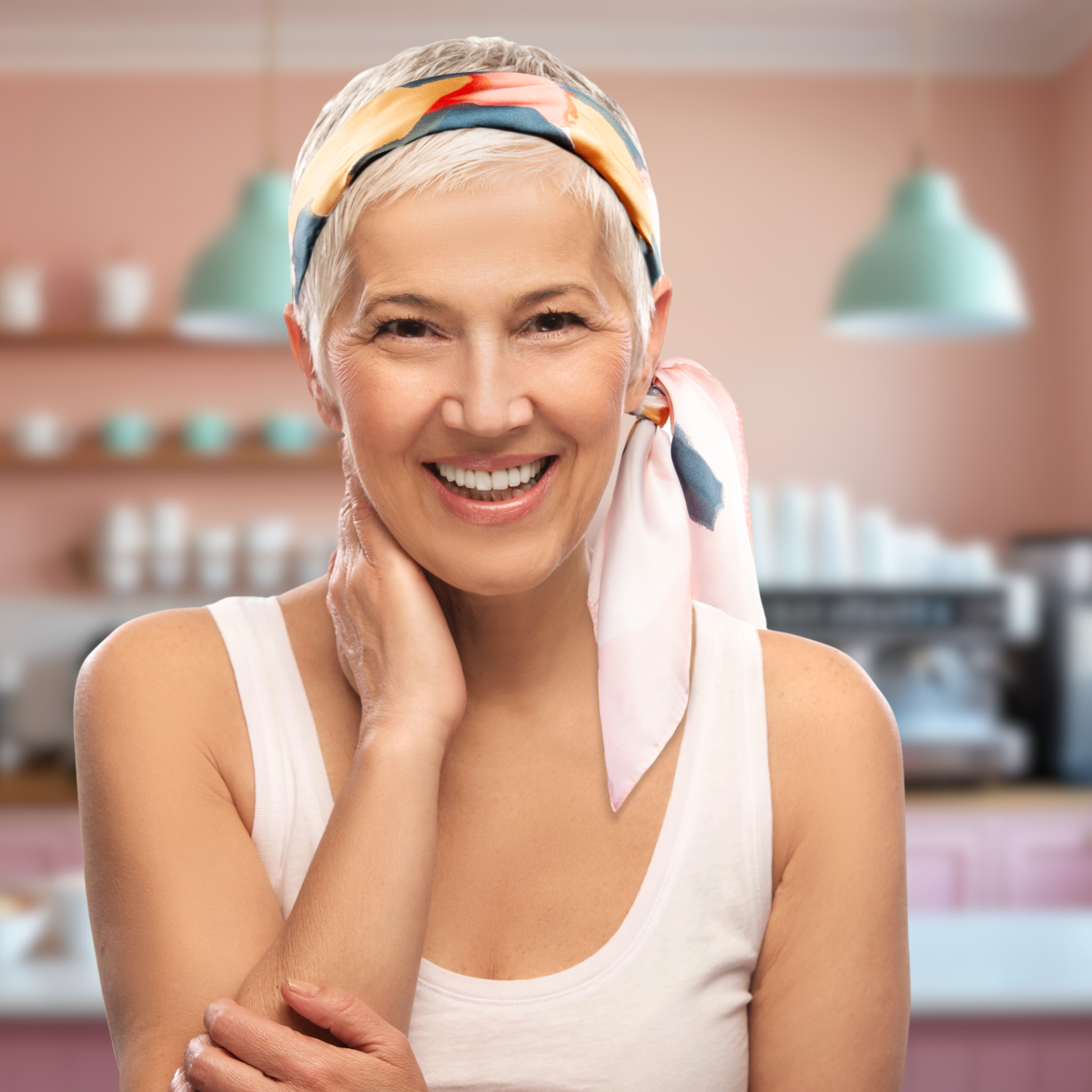 Mature model with short hair wearing a satin non-slip headband