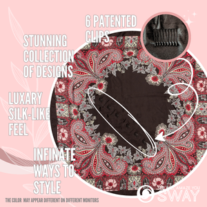 Black and red floral and swirl design satin scarf laid flat